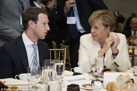 Angela Merkel overheard confronting Mark Zuckerberg over the need to 'do some work' about "racist" posts on Facebook. Photo: Corbis, www.dailymail.co.uk