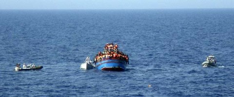 Boat overcrowded with migrants in the Mediterranean Sea. The boat was carrying nearly 600 people, and the remaining 566 survivors were rescued by the navy frigate Grecale and were headed to the port at Pozzallo, on the southern tip of Sicily. (Photo: Italian Navy, 2014-06-29)