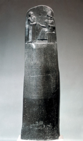 Law Code Stele of Hammurabi, king stands before the throne of the sun god (god of great "light", Shamash)