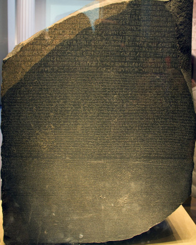 Dating from 196 BC, the Rosetta Stone was carved in honour of Pharaoh Ptolemy V and his ancestors. The text as such was composed so that three different segments of the population could read it: in hieroglyphics for the priests, in a derived demotic script for everyday purposes, and in Greek for the then rulers of Egypt. Since the Stone was indispensable when it came to deciphering the hieroglyphic code, it is now seen as early testimony to the work of translators.