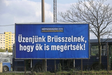 "We send a message to Brussels, so that they understand it too,” says the government sponsored billboard in Hungary