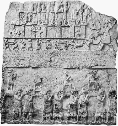 Assyrian soldiers of Tiglath-pileser III carrying captured idols from enemy temples, ca. 728 BC, relief from Nimrud